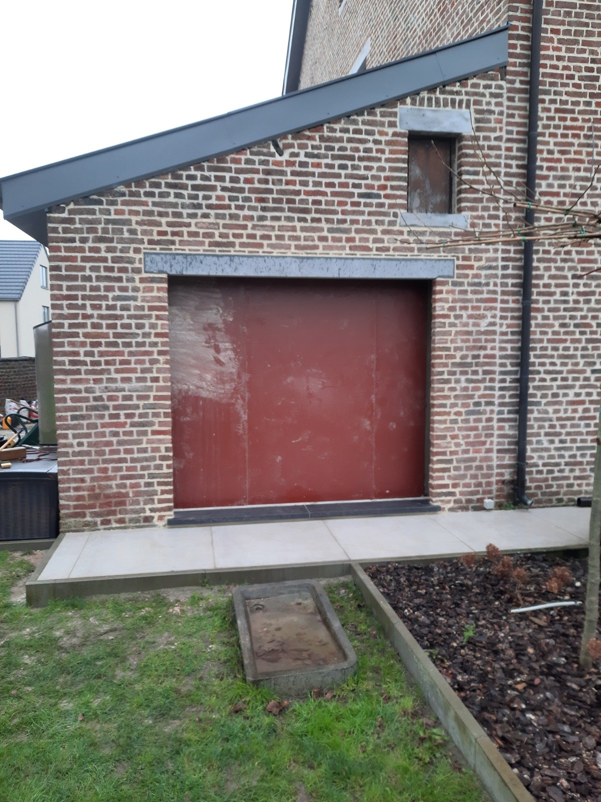 Ouverture d'une baie dans un garage à Profondeville, entreprise de construction en Wallonie